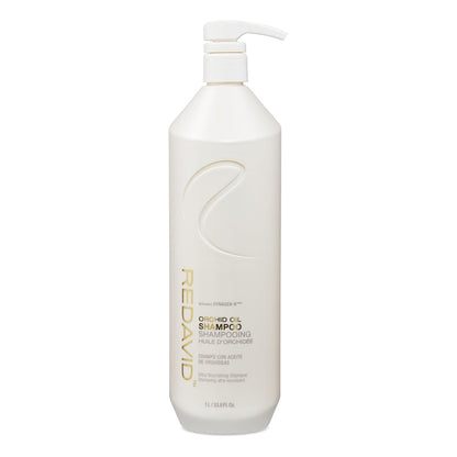 A large white bottle of REDAYVID Quinoa Curl Shampoo with a white pump dispenser, featuring gold and black text on a clean white background.